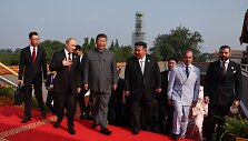 Vladimiras Putinas, Xi Jinpingas, Kim Jong Unas