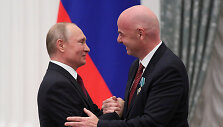 Vladimiras Putinas ir Gianni Infantino / EVGENIA NOVOZHENINA / REUTERS