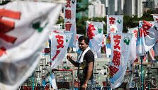 Tiananmenio aik&scaron;tėje vyko 1989 m. protestuotojų žudynių minėjimas