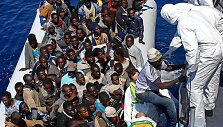 Libijos migrantai.