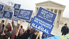 Protestuotojai prie&scaron; B.Obamos pasiūlytą privalomą sveikatos draudimą