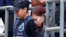 Indonezietė Siti Aishah atvedama į teismo salę