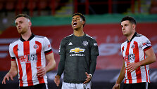Marcusas Rashfordas (viduryje)