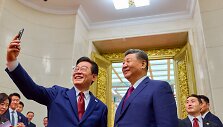 Lee Jae-myungas, Xi Jinpingas