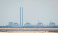 Vaizdas į Zaporižios atominę elektrinę i&scaron; Nikopolio / ALINA SMUTKO / REUTERS