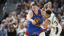 Nikola Jokičius ir Giannis Antetokounmpo