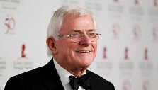 Phil Donahue pozuoja St. Jude vaikų ligoninės jubiliejaus proga. / Danny Moloshok / REUTERS