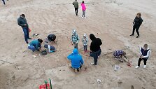 Inscenizuotų archeologinių kasinėjimų akimirka