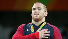 Kyle'as Snyderis su olimpiniu aukso medaliu 2016 m. Rio de Žaneire