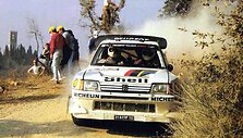 Juha Kankkunen su &bdquo;Peugeot 205 Turbo 16&ldquo;. Wikipedia nuotr. CC BY-SA 3.0