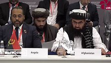 Afganistano teisingumo ministerijos vadovas Abdulas Hakimas Haqqani (de&scaron;inėje)