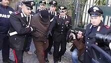 Vedamas sulaikytasis Pasquale Russo.