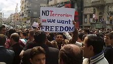 Protestai Sirijoje nesiliauja.