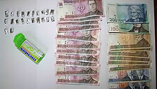 Pas sulaikytą moterį rasti narkotikai ir pinigai