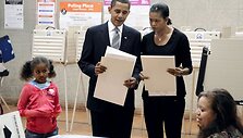 Barackas Obama su žmona ir dukra