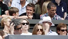 Davidas Beckhamas su sūnumi Brooklynu stebi dvikovą tarp ispano Rafaelio Nadalio ir brito Andy Murray'aus.