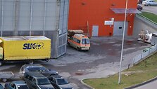 Krovininiu taksi paverstas specialiosios paskirties automobilis su &scaron;vyturėliais ir užra&scaron;u &bdquo;Ambulance&ldquo;.