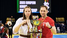 Melanija &Scaron;ostak  su treneriu Andrejumi Podchaliuzinu