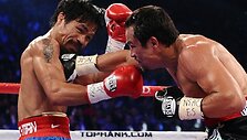 Manny Pacquiao (kairėje) prie&scaron; Juaną Manuelį Marquezą.