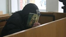 M.Kum&scaron;lys teisme bandė dangstytis savo veidą.