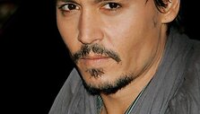 Foto naujienai: Johnny Deppas ir prezervatyvai