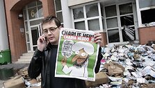 Ant žurnalo vir&scaron;elio spausdinama prana&scaron;o Mohamedo karikatūra.