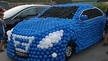Pagamintas &bdquo;Subaru Legacy&ldquo; i&scaron; oro balionų
