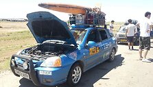 &bdquo;Mongol Rally&ldquo; dienora&scaron;tis. &Scaron;kotų automobilis su baidare