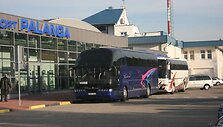 Sugrįžusieji i&scaron;gabenti autobusais.