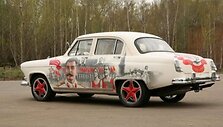 &bdquo;Volga GAZ-21&ldquo; su &bdquo;Porsche Cayenne Turbo&ldquo; varikliu