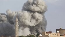 Bombarduojamas Ras al Aino miestas