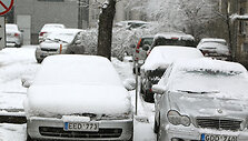 Apsnigti automobiliai