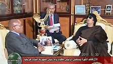 Jacobas Zuma (kairėje) ir Muamaras Kadhafi (de&scaron;inėje)