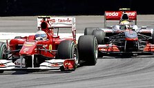 Lewisas Hamiltonas atakuoja Fernandą Alonso