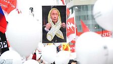 Mitingo dalyvių plakatai