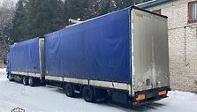 Vilkikas su vogtomis prabangių automobilių dalimis