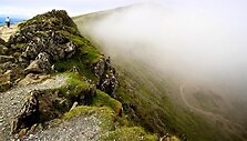 Karolis bekopiant į auk&scaron;čiausia Velso kalną. Snowdon