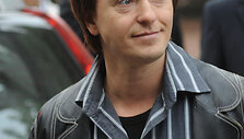 ITAR-TASS 178: MOSCOW, RUSSIA. SEPTEMBER 20, 2009. Actor Sergei Bezrukov at a ceremony to unveil a plaque with the name and handprint of Oscar-winning Soviet/Russian film director Menshov in Moscow's Walk of Stars, outside Mosfilm Studios at Mosfilmovskaya Street. (Photo ITAR-TASS / Vladimir Astapko