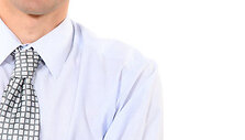 Businessman stood with arms folded