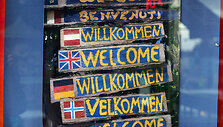 užra&scaron;as "welcome" įvairiomis kalbomis