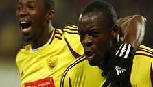 Lacina Traore'as ir Christopheris Samba