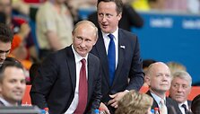 Vladimiras Putinas stiprino &bdquo;kieto vaikino&ldquo; įvaizdį, atvykęs stebėti dziudo turnyro Londono olimpiadoje