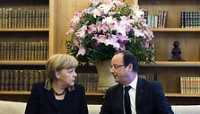 Angela Merkel ir Francois Hollande'as