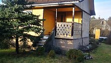 Irena kartu su vyru atnaujino sodo namelį