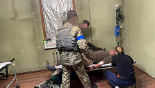 Traumų stabilizavimo punktas prie&scaron;akinėse Ukrainos karo linijose, kur dirba lietuvis gydytojas
