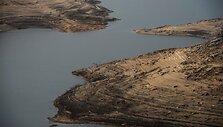 Po sausros Ispanijoje i&scaron;niro užtvankos užlieto kaimo griuvėsiai