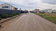 Už sąvartos zonos esančios Romaini&scaron;kių gatvės ir jos &scaron;alutinių gatvių būklė