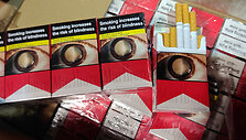 Muitinės kriminalinės tarnybos pareigūnai likvidavo nelegalaus alkoholio ir cigarečių sandėlį