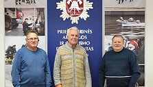 Žvejys su savo gelbėtojais