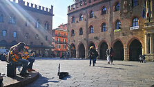 Gatvės muzika Piazza Maggiore aik&scaron;tėje